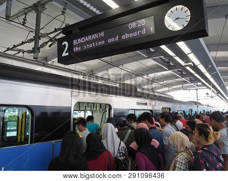 Jakarta, Indonesia - March 23, 2019: Crowd Of People Getting On The Train At Lebak Bulus Mrt Station
