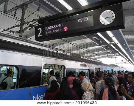 Jakarta, Indonesia - March 23, 2019: Crowd Of People Getting On The Train At Lebak Bulus Mrt Station