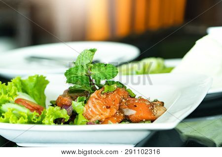 Spicy Salmon Salad With Fresh Mint And Basil, Thai Food Style. Home Made Food. Concept For A Tasty A