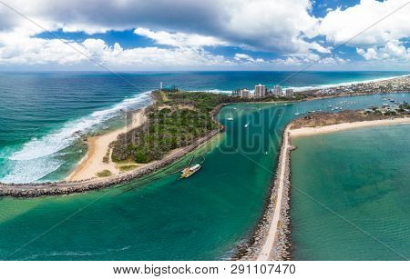 Drone view of famous Mooloolaba beach and marina on sunny day