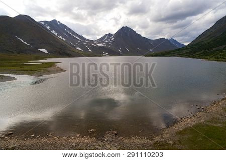 Cloudy August Evening Over The Shore Of Bolshoe Hadatayoganlor Lake (shooting From A Quadcopter). Po