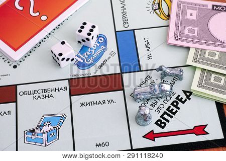 Tambov, Russian Federation - January 26, 2018 Monopoly Board Game. Three Tokens On Field Go Of Gameb