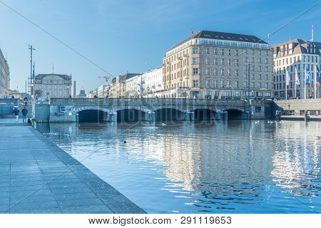 Hamburg, Germany - February 15, 2019: View Of Bridge Over Alster River With Jungfernstieg Street In 