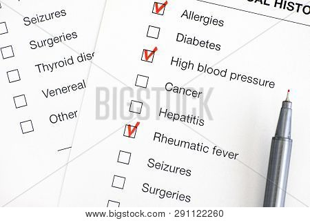 Past Medical History Questionary With Marks And Pen. Close-up.