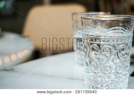 Luxury Emtry Glass On The Marble Dinner Table.