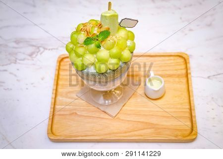 Green Melon Ball Shape Are Arranged On The Top Of Bingsu (korean Ice-cream Style) And Decorated With