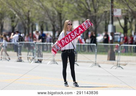 Chicago, Illinois, Usa - May 5, 2018: The Polish Constitution Day Parade, Young Polish Woman Holding