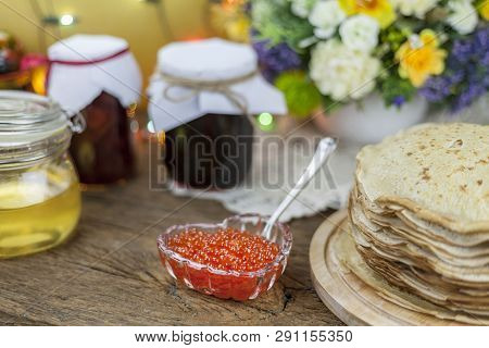 Traditional Russian Pancakes With Red Cavier And Honey