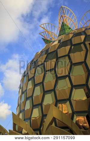China, Hainan Island, Dadonghai Bay - December 1, 2018: City Street, Shopping Center Pineapple In Th