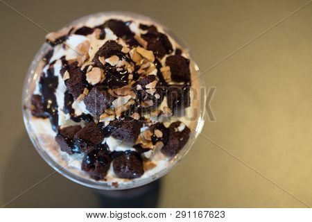 Chocolate Sauce Whipped Cream Nut And Brownies Decoration On Top Iced Drink