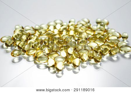 Fish Oil Supplement Capsules Isolated On White Background