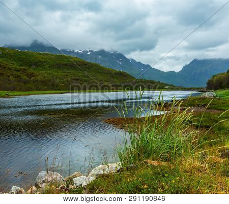 Lofoten Fjord And Mountains Summer Cloudy Landscape, Norway.