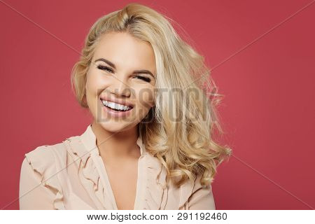 Nice Woman With Blonde Curly Bob Hairstyle And Pretty Smile Having Fun And Laughing Against Colorful