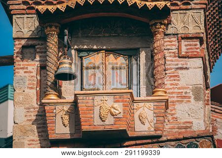 Tbilisi, Georgia. Close Up Details Of Famous Rezo Gabriadze Marionette Theater Clock Tower On Old Ci