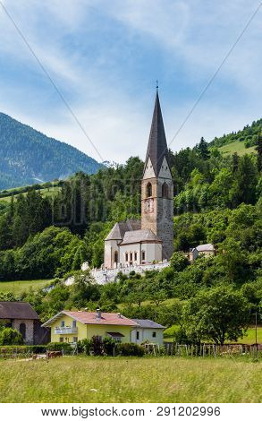 Summer View To Pfarrhaus Burgeis (the Maria Reception Church Or Maria Empfangniskirche), Italy. Buil