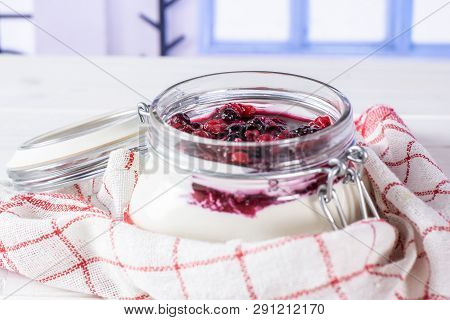 Recipe Step By Step No Bake Cheesecake In A Jar Enwrapped In A Towel With Blue Window In A White Kit