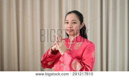 Asian Chinese Middle Age Woman In Red Constum For New Year
