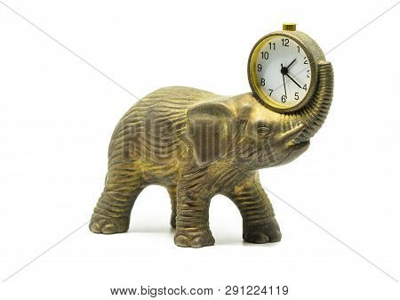 Isolated Bronze Anticue Elephant With A Clock On A White Background