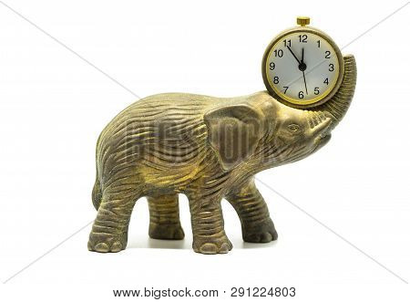 Isolated Bronze Anticue Elephant With A Clock On A White Background