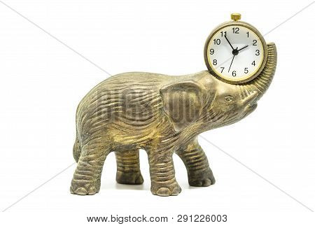 Isolated Bronze Anticue Elephant With A Clock On A White Background