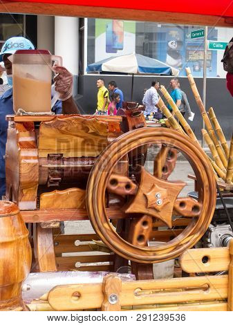 Cali, Colombia - February, 2019: Street Seller Of Cane Juice Called Guarapo
