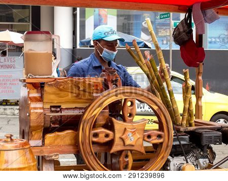 Cali, Colombia - February, 2019: Street Seller Of Cane Juice Called Guarapo