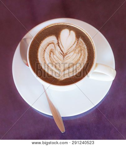 Hot Cappuccino Coffee Decorated With Blooming Flower Froth Art On Steamed Milk Foam In White Cup On 