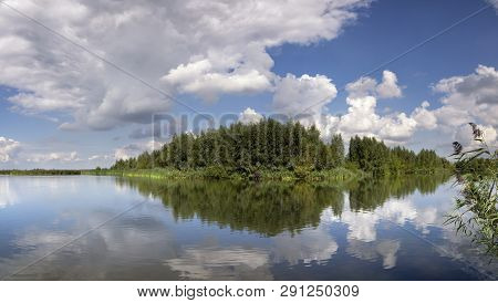 View From The Pier In Huizen On Lake Gooimeer With A Beautiful Reflection