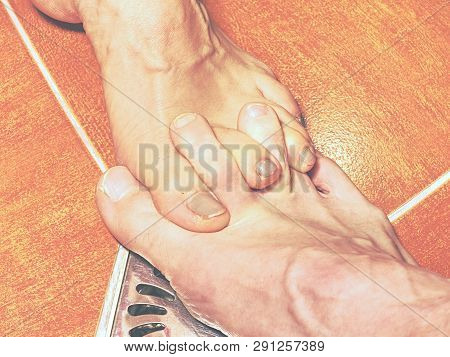 Feet Of Girlfriend  And Boyfriend Together In Tilled Shower Stall. Modern Design Of Bathroom.