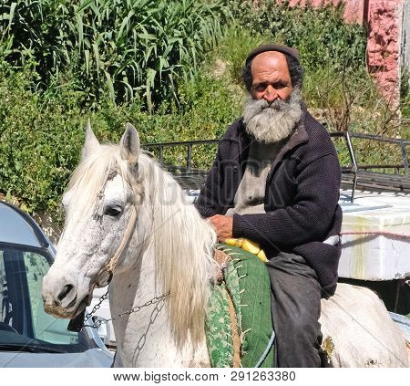 Morocco, The Market Square Of The City Of Fez. March 12 2019. Horseman Riding A Bazaar