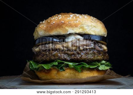 Vegan Burger With Eggplant, Mushrooms, Lettuce And Mayonnaise