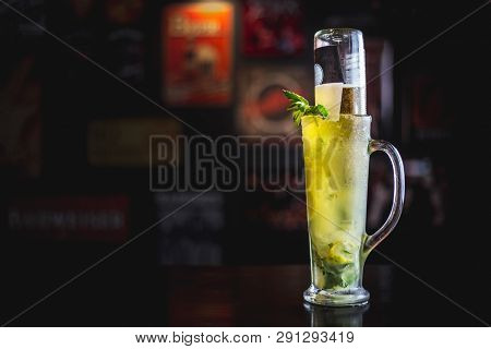 Mojito Beer Cocktail In A Dark Ambient Bar