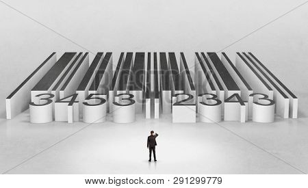 Young businessman standing in front of a big codebar