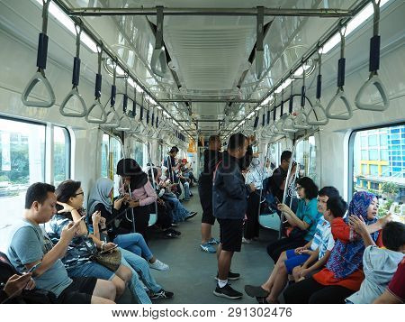 Jakarta, Indonesia - March 23, 2019: Passengers On The Train Of Mrt Jakarta At Lebak Bulus Mrt Stati