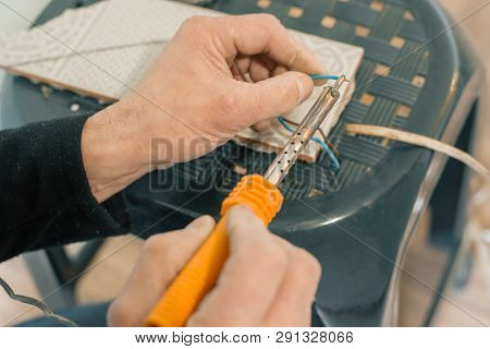Male Holding Soldering Iron Tool Repairing, Electrical Wire Connection, Soldering With A Soldering I