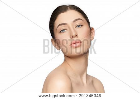 Beautiful, Gorgeous Model With Stylish Naturale Make Up, Plump Lips, Perfect Skin And Bare Shoulders