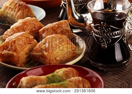 Middle Eastern Or Arabic Dishes And Assorted Meze, Concrete Rustic Background. Turkish Bread Or Turk