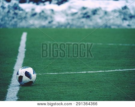 School Football Ground While Snow At January Daytime