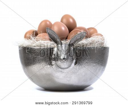 Silver Easter bowl with eggs, on a white background
