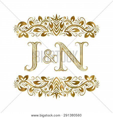J And N Vintage Initials Logo Symbol. The Letters Are Surrounded By Ornamental Elements. Wedding Or 