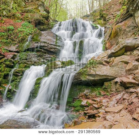 Waterfall Shypit In Beech Forest In The Carpathian Mountains Near The Village Pylypets In Early Spri