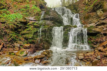 Multi-level Water Cascade Of Waterfall Shypit In Beech Forest In The Carpathian Mountains Near The V