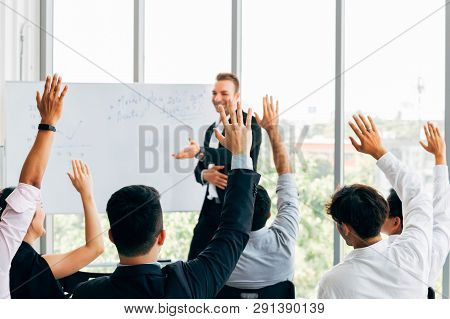 Many Business People Participants Raising Up Their Hand In Business Seminar Conference Event Inside 