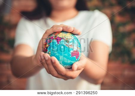Save The Earth And Care Environment Concept, Close-up Portrait Of Woman Is Holding Mockup Global In 