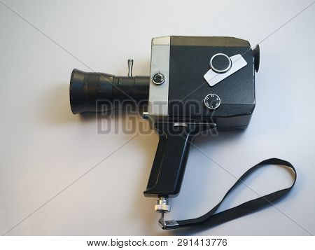 Retro 16mm Video Camera On White Background.