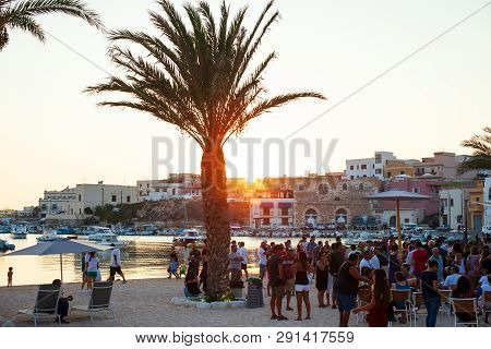 Lampedusa, Italy - August, 01: People In The Beach Bar At The Sunset On August 01, 2018