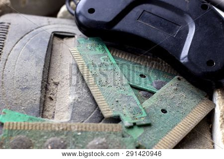 Retro Gamepad, Controller And Game Console Covered Vith Dirt And Dust. Obsolete And Outdated Technol