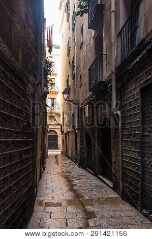 Perspective View Of The Narrow Street In The Gothic Quarter, Barcelona, Spain