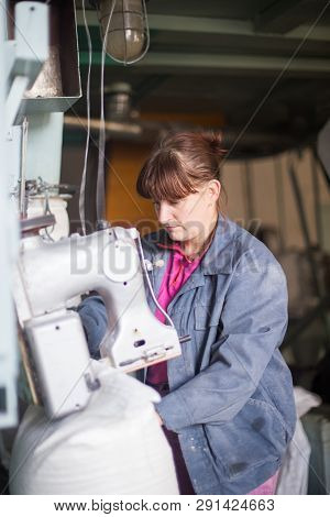 14 October 2014.ukraine.kyiv.work On The Production Of Agricultural Products. A Caucasian Woman Dres