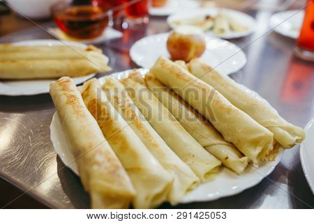 Pancakes With Cheese Are Served With Honey